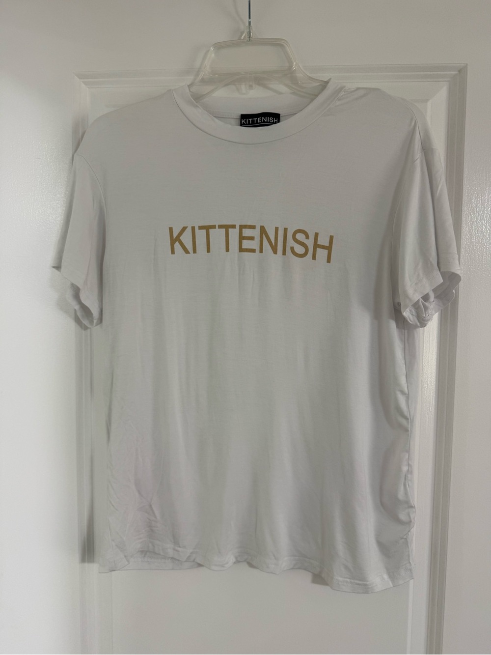 Women’s white graphic t-shirt Kittenish gold lettering